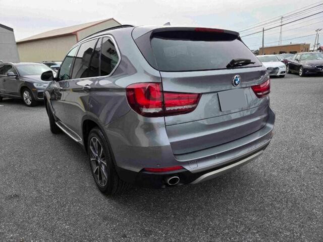 Серый БМВ Х5, объемом двигателя 3 л и пробегом 72 тыс. км за 19700 $, фото 7 на Automoto.ua
