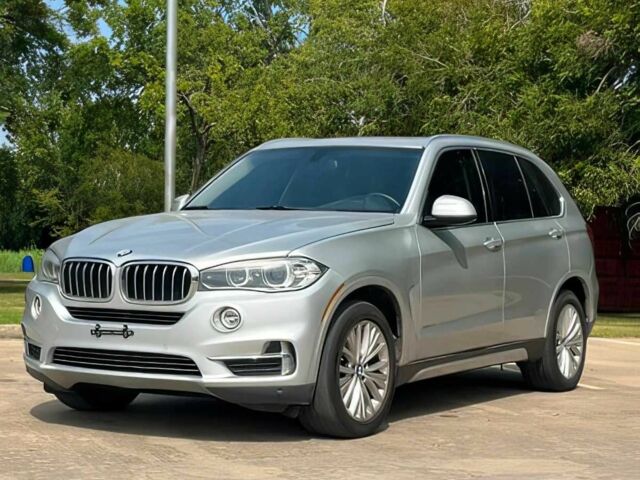 Серый БМВ Х5, объемом двигателя 3 л и пробегом 75 тыс. км за 21500 $, фото 2 на Automoto.ua