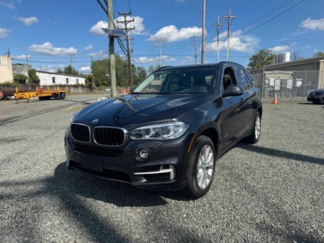 Серый БМВ Х5, объемом двигателя 3 л и пробегом 70 тыс. км за 17000 $, фото 2 на Automoto.ua