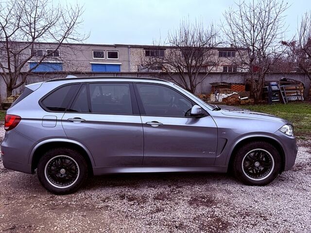 Серый БМВ Х5, объемом двигателя 3 л и пробегом 163 тыс. км за 41000 $, фото 3 на Automoto.ua