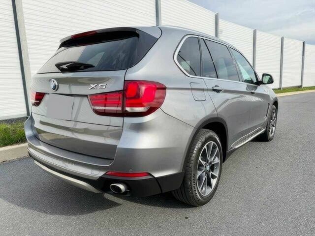 Серый БМВ Х5, объемом двигателя 3 л и пробегом 73 тыс. км за 6800 $, фото 4 на Automoto.ua