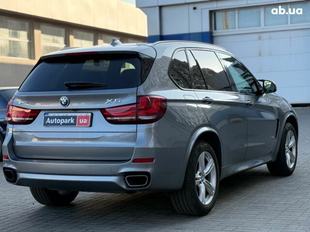 Серый БМВ Х5, объемом двигателя 2 л и пробегом 137 тыс. км за 36990 $, фото 5 на Automoto.ua