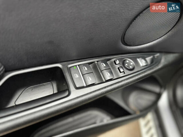 Серый БМВ Х5, объемом двигателя 3 л и пробегом 127 тыс. км за 19700 $, фото 17 на Automoto.ua