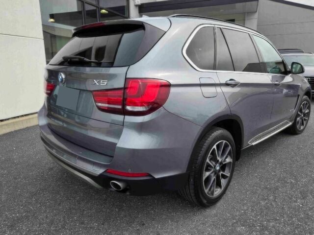 Серый БМВ Х5, объемом двигателя 3 л и пробегом 72 тыс. км за 19700 $, фото 5 на Automoto.ua