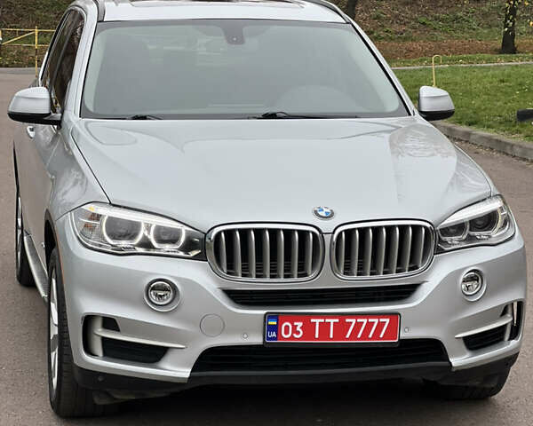 Серый БМВ Х5, объемом двигателя 2 л и пробегом 246 тыс. км за 18850 $, фото 7 на Automoto.ua
