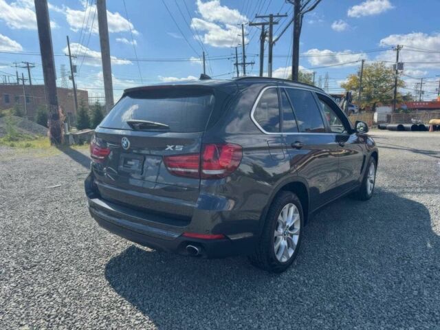 Серый БМВ Х5, объемом двигателя 3 л и пробегом 70 тыс. км за 17000 $, фото 6 на Automoto.ua