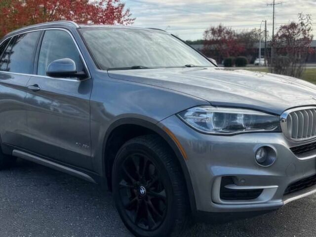 Серый БМВ Х5, объемом двигателя 3 л и пробегом 58 тыс. км за 25000 $, фото 2 на Automoto.ua