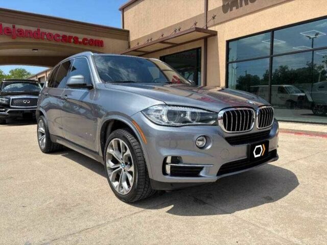 Серый БМВ Х5, объемом двигателя 3 л и пробегом 78 тыс. км за 8500 $, фото 4 на Automoto.ua