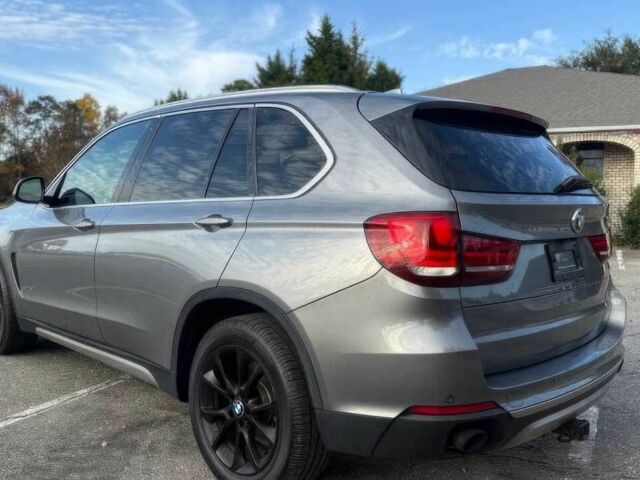 Серый БМВ Х5, объемом двигателя 3 л и пробегом 58 тыс. км за 25000 $, фото 3 на Automoto.ua