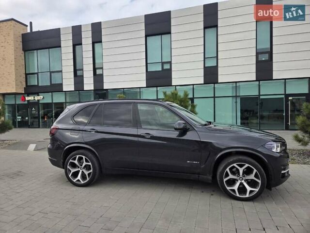 Серый БМВ Х5, объемом двигателя 2 л и пробегом 165 тыс. км за 35999 $, фото 4 на Automoto.ua