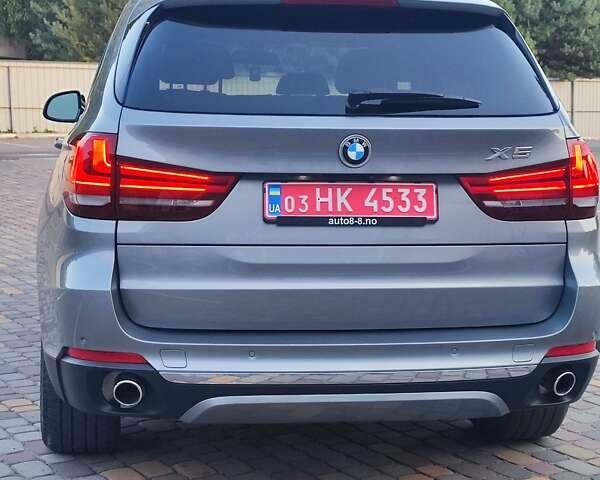 Серый БМВ Х5, объемом двигателя 3 л и пробегом 40 тыс. км за 28700 $, фото 4 на Automoto.ua