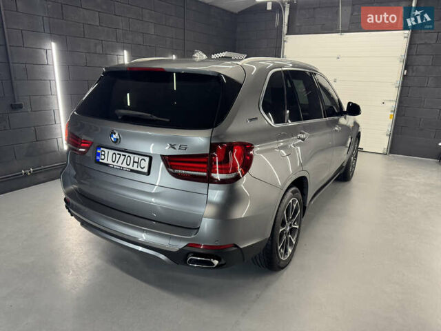 Серый БМВ Х5, объемом двигателя 2 л и пробегом 198 тыс. км за 27000 $, фото 3 на Automoto.ua