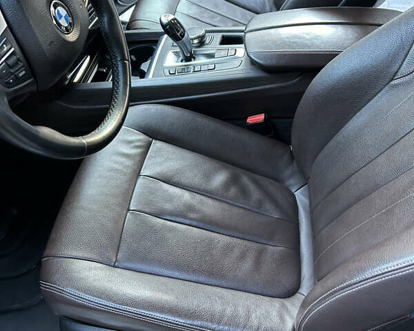 Серый БМВ Х5, объемом двигателя 2 л и пробегом 165 тыс. км за 12700 $, фото 6 на Automoto.ua