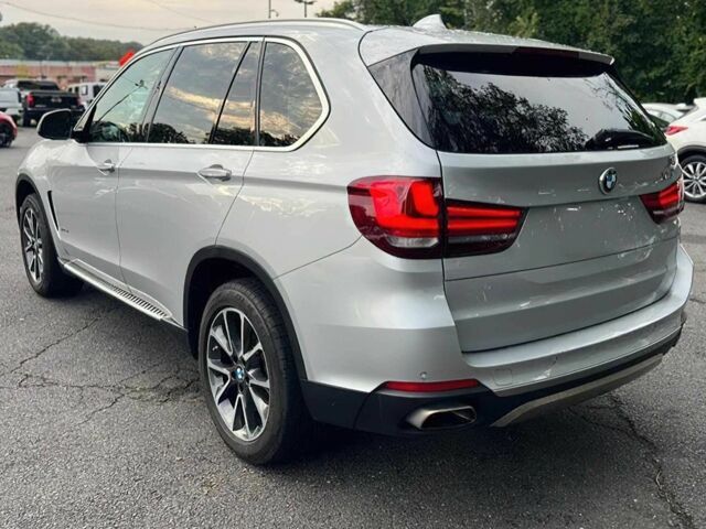 Серый БМВ Х5, объемом двигателя 3 л и пробегом 40 тыс. км за 8500 $, фото 4 на Automoto.ua