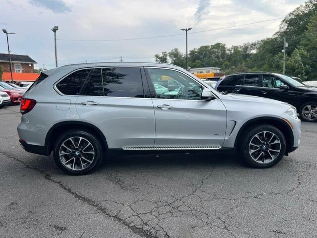 Серый БМВ Х5, объемом двигателя 3 л и пробегом 40 тыс. км за 8500 $, фото 6 на Automoto.ua