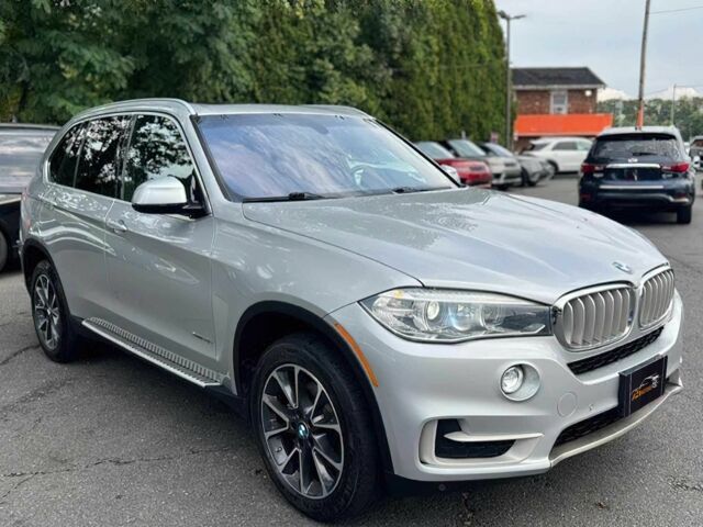 Серый БМВ Х5, объемом двигателя 3 л и пробегом 40 тыс. км за 8500 $, фото 2 на Automoto.ua