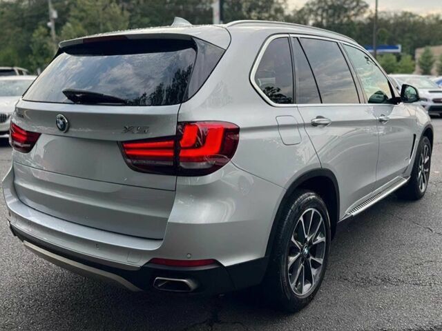 Серый БМВ Х5, объемом двигателя 3 л и пробегом 40 тыс. км за 8500 $, фото 5 на Automoto.ua