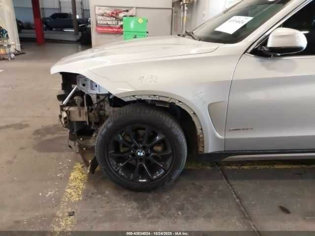 Сірий БМВ Х5, об'ємом двигуна 3 л та пробігом 67 тис. км за 7000 $, фото 5 на Automoto.ua