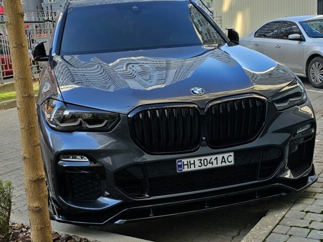 Серый БМВ Х5, объемом двигателя 3 л и пробегом 65 тыс. км за 49900 $, фото 1 на Automoto.ua