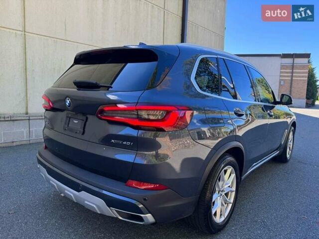 Сірий БМВ Х5, об'ємом двигуна 3 л та пробігом 161 тис. км за 18700 $, фото 3 на Automoto.ua