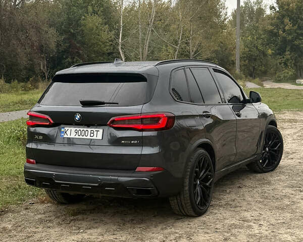 Серый БМВ Х5, объемом двигателя 3 л и пробегом 160 тыс. км за 50000 $, фото 3 на Automoto.ua