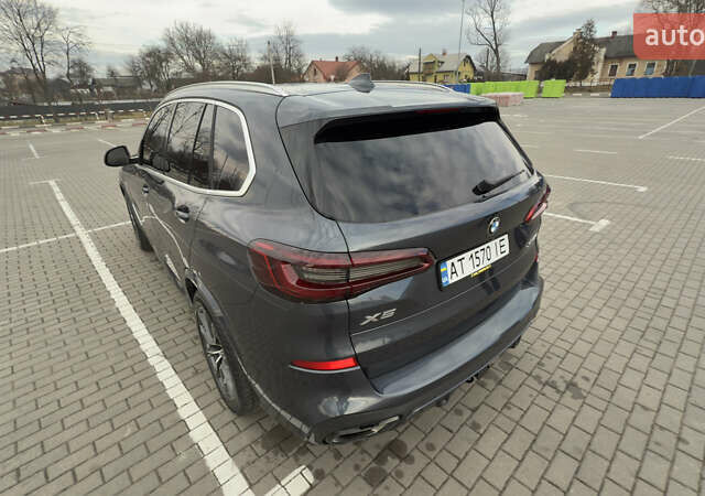 Серый БМВ Х5, объемом двигателя 3 л и пробегом 130 тыс. км за 52550 $, фото 25 на Automoto.ua