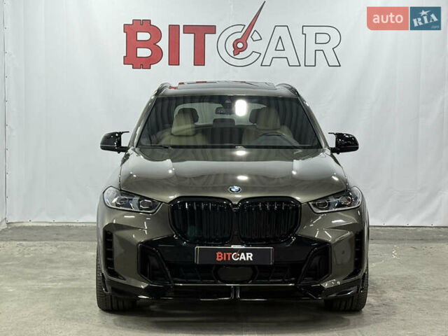 Серый БМВ Х5, объемом двигателя 3 л и пробегом 92 тыс. км за 49000 $, фото 2 на Automoto.ua