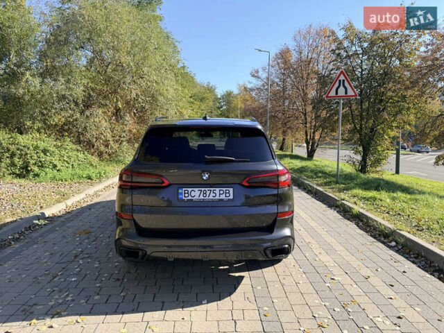 Серый БМВ Х5, объемом двигателя 3 л и пробегом 65 тыс. км за 57900 $, фото 1 на Automoto.ua