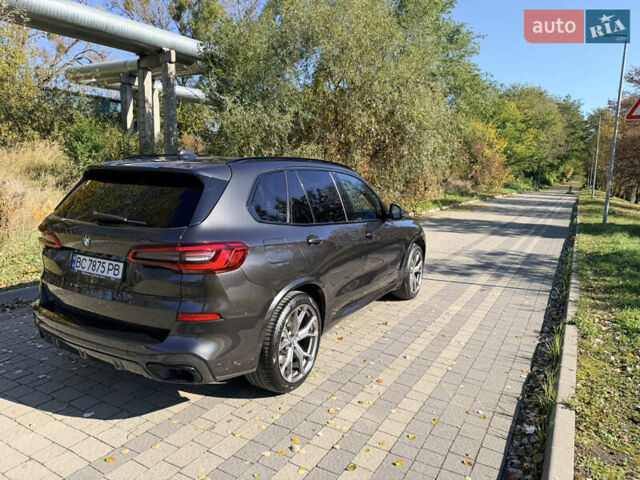 Серый БМВ Х5, объемом двигателя 3 л и пробегом 65 тыс. км за 57900 $, фото 2 на Automoto.ua
