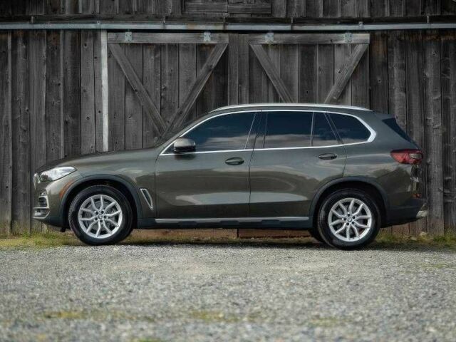 Серый БМВ Х5, объемом двигателя 3 л и пробегом 50 тыс. км за 40000 $, фото 5 на Automoto.ua