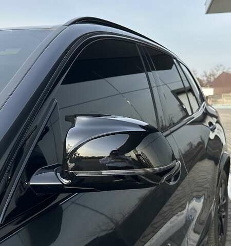 Серый БМВ Х5, объемом двигателя 3 л и пробегом 55 тыс. км за 59800 $, фото 3 на Automoto.ua