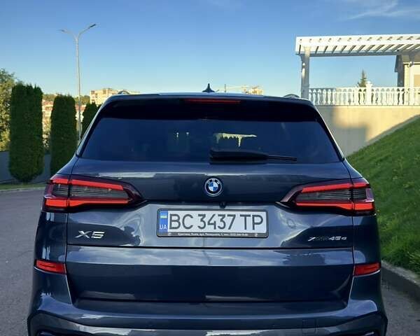 Серый БМВ Х5, объемом двигателя 3 л и пробегом 74 тыс. км за 72500 $, фото 3 на Automoto.ua