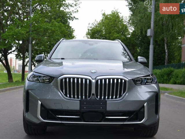 Серый БМВ Х5, объемом двигателя 3 л и пробегом 57 тыс. км за 72000 $, фото 3 на Automoto.ua