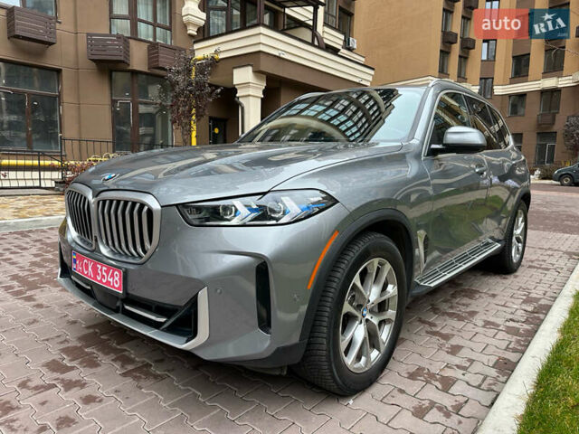 Сірий БМВ Х5, об'ємом двигуна 3 л та пробігом 65 тис. км за 70900 $, фото 1 на Automoto.ua