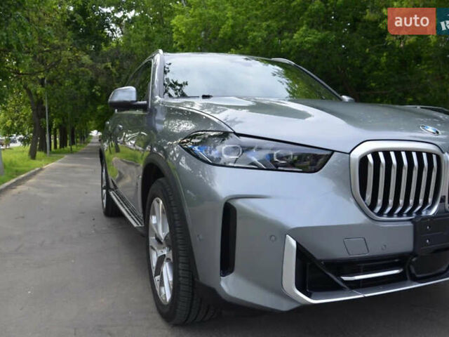 Серый БМВ Х5, объемом двигателя 3 л и пробегом 57 тыс. км за 72000 $, фото 2 на Automoto.ua