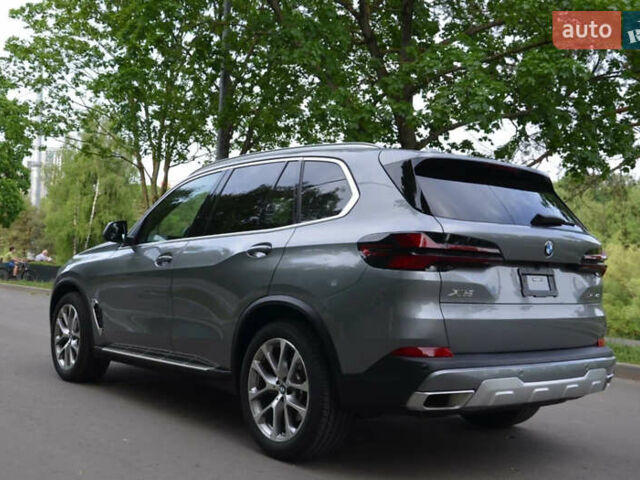 Серый БМВ Х5, объемом двигателя 3 л и пробегом 57 тыс. км за 72000 $, фото 4 на Automoto.ua