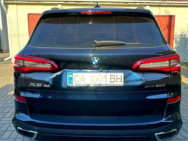 Серый БМВ Х5, объемом двигателя 3 л и пробегом 75 тыс. км за 67000 $, фото 2 на Automoto.ua