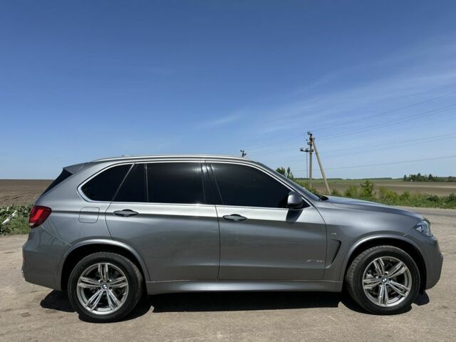 Серый БМВ Х5, объемом двигателя 3 л и пробегом 140 тыс. км за 26700 $, фото 7 на Automoto.ua