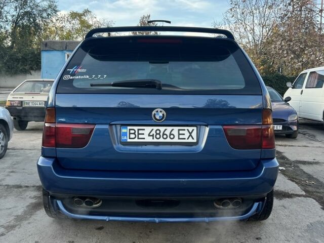 Синий БМВ Х5, объемом двигателя 4.4 л и пробегом 429 тыс. км за 7999 $, фото 7 на Automoto.ua