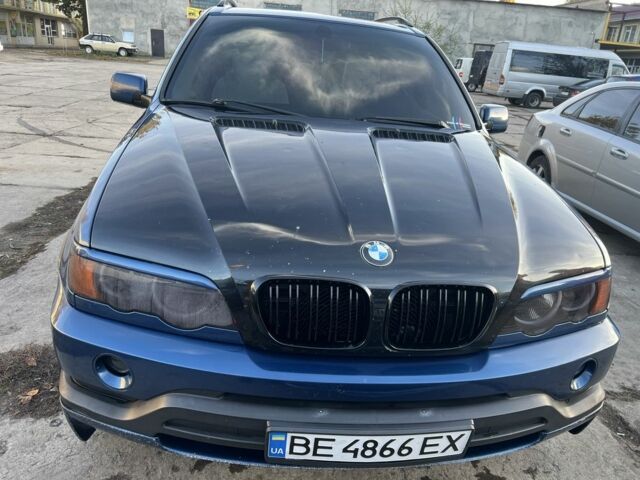Синий БМВ Х5, объемом двигателя 4.4 л и пробегом 429 тыс. км за 7999 $, фото 4 на Automoto.ua