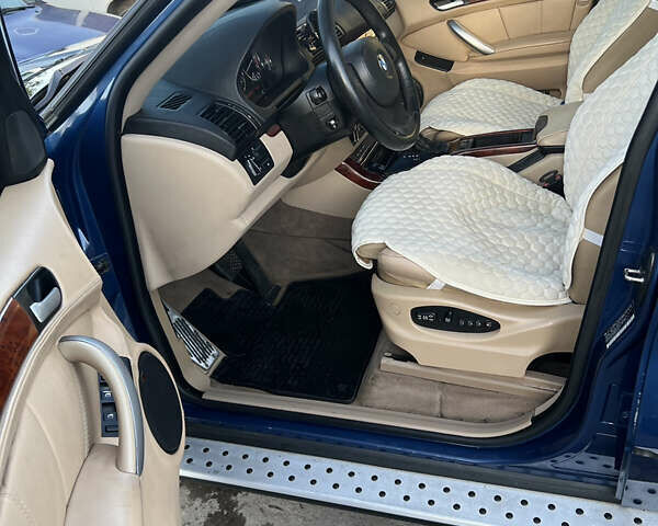 Синий БМВ Х5, объемом двигателя 4.4 л и пробегом 430 тыс. км за 7499 $, фото 13 на Automoto.ua