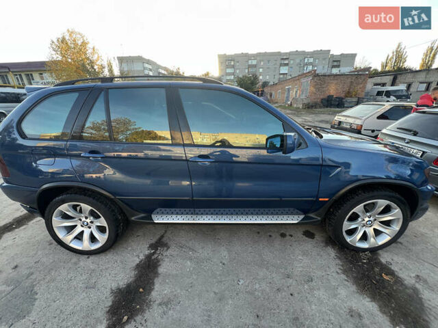 Синий БМВ Х5, объемом двигателя 4.4 л и пробегом 430 тыс. км за 7499 $, фото 6 на Automoto.ua