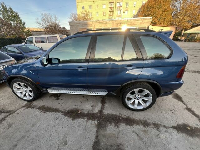 Синий БМВ Х5, объемом двигателя 4.4 л и пробегом 429 тыс. км за 7999 $, фото 2 на Automoto.ua