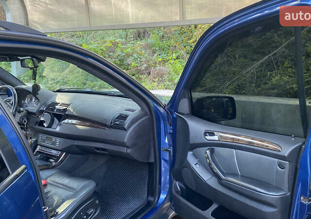 Синій БМВ Х5, об'ємом двигуна 4.4 л та пробігом 259 тис. км за 10000 $, фото 20 на Automoto.ua