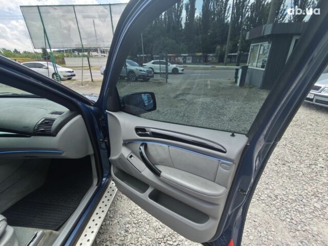 Синий БМВ Х5, объемом двигателя 4.4 л и пробегом 383 тыс. км за 7500 $, фото 14 на Automoto.ua
