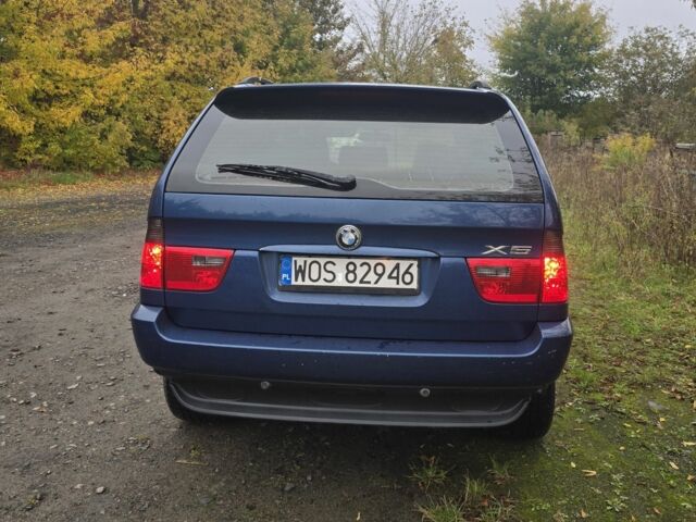 Синий БМВ Х5, объемом двигателя 3 л и пробегом 340 тыс. км за 4300 $, фото 4 на Automoto.ua