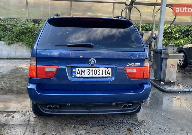 Синій БМВ Х5, об'ємом двигуна 4.4 л та пробігом 259 тис. км за 10000 $, фото 4 на Automoto.ua
