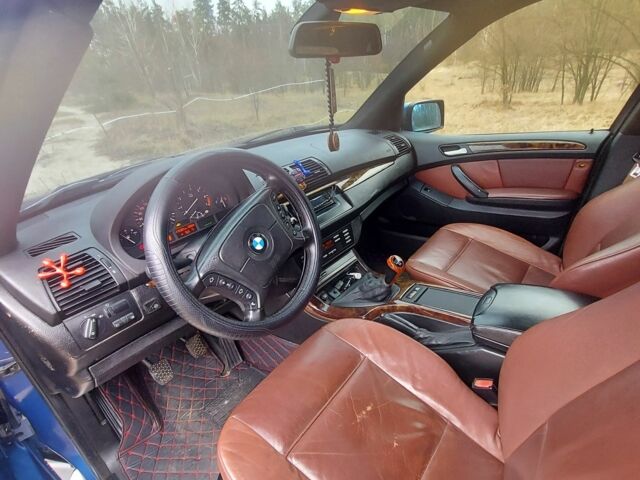 Синий БМВ Х5, объемом двигателя 3 л и пробегом 370 тыс. км за 7600 $, фото 4 на Automoto.ua