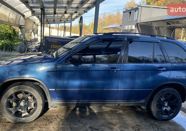 Синій БМВ Х5, об'ємом двигуна 4.4 л та пробігом 259 тис. км за 10000 $, фото 13 на Automoto.ua
