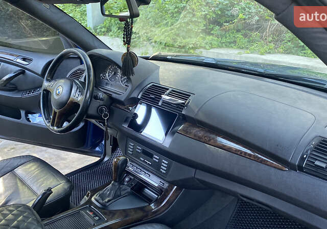 Синій БМВ Х5, об'ємом двигуна 4.4 л та пробігом 259 тис. км за 10000 $, фото 18 на Automoto.ua